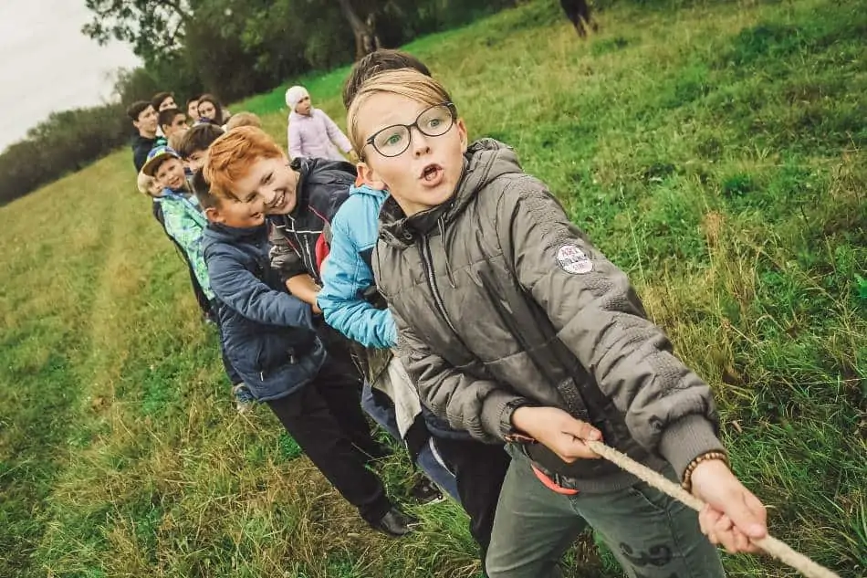 Kids playing tug of war.