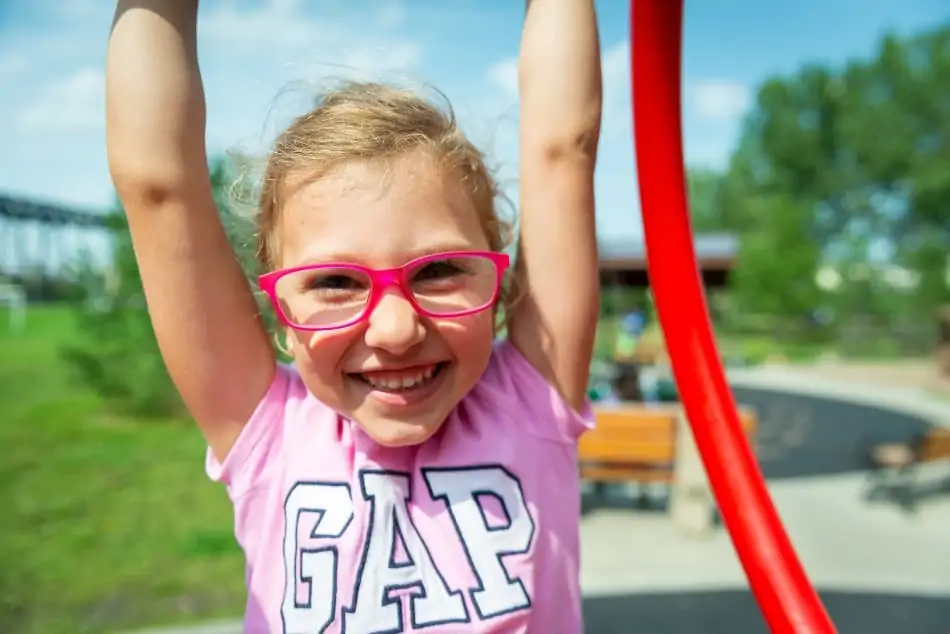 A happy kid hanging. 